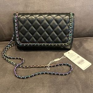 Urban expressions small cross body quilted bag.